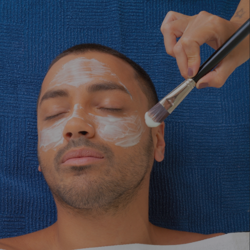 Zen Luxe Med Spa Aesthetic Services with Injector Resha A man is getting a facial treatment at a spa.