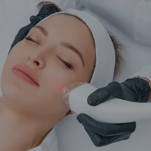 Zen Luxe Med Spa Aesthetic Services with Injector Resha A woman is getting a aerolase NeoSkin Laser Treatments for Anti-aging