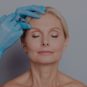 Botox and dysport injection being conducted on a mature woman